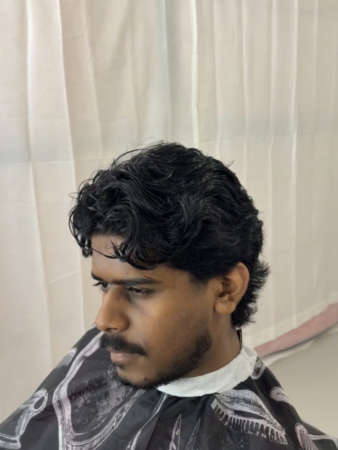 Styled curls with a clean fade after the appointment